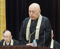 執政方針の進捗を報告する川田宗務総長